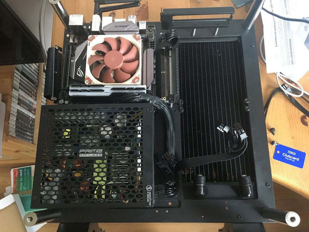 Had to make a big hole in the front for cable routing. Got a rubber grommet for neatness but you can't really see that well it's so jammed full of cable.