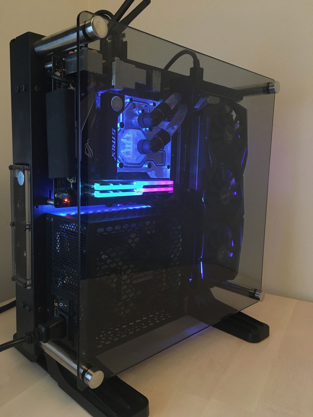 Took a lot of filing to get the combo unit to fit snugly. Worth the effort though and I think it looks very clean. Definitely a unique solution and it fits like a charm. I wonder why thermaltake haven't designed some of these things into their cases. Would've made my job easier.