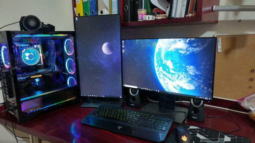 In the picture are both of my beloved Dell U2417H-UltraSharp screens, my Razer DeathStalker Chroma and my SteelSeries Rival310