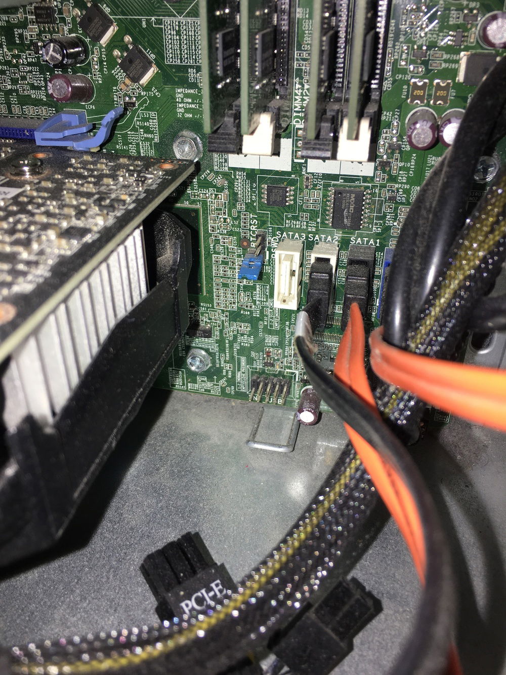 This picture is to show the poorly designed mobo, granted, it probably wasn't intended to be gamed on. My problem here is that I was limited to the graphics cards I could install without bumping into the SATA ports. I settled on the Zotac 1060 mini because it was 10.5" and I had 11" to work with. I would've had an EVGA SSC 1060 but it simply didn't fit.