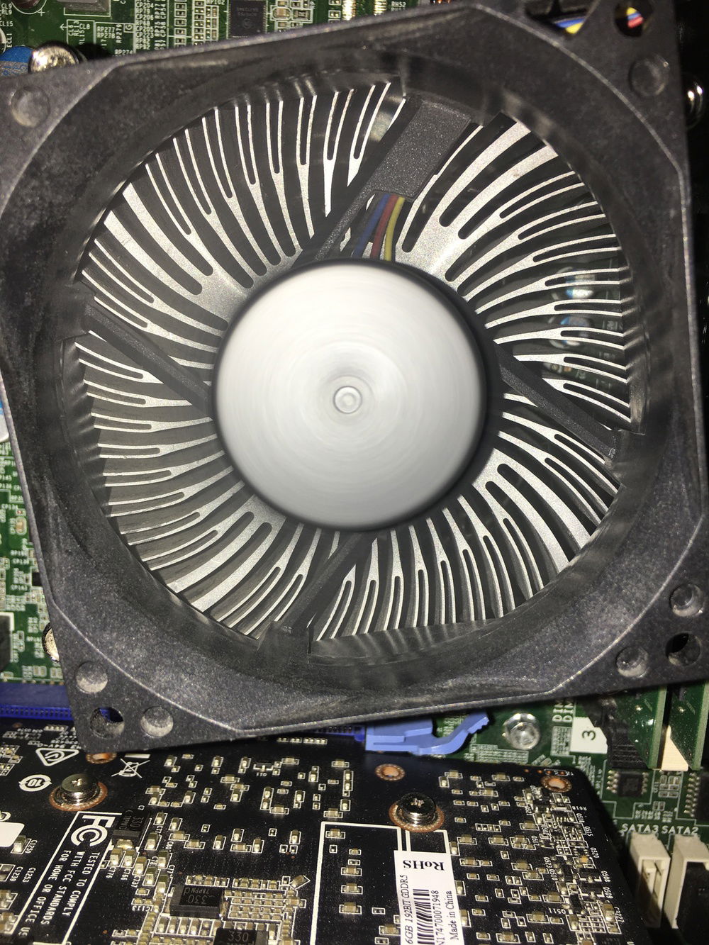 A stock CPU cooler that also came on the computer. No way to mount an AIO, and it doesn't get too hot anyways, so I left it. Hopefully gonna do a thermal paste swap soon.