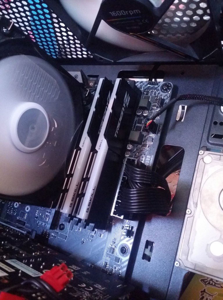 The Almighty Ram and H7 Cooler. Helpin keep my system cool as well as give me nice RGB. Also note that the fans on the Cooler came from a Silverstone AIO that died which I don't think they sell the exact fan separately without the AIO Cooler thus it not being listed below. If anyone is interested, it came from the Silverstone Tundra Td02-lite.

NOTE That the GPU shown in this picture is from my previous GPU which is a 970. I have since updated to 2060 but I'm too lazy to retake this picture xD.