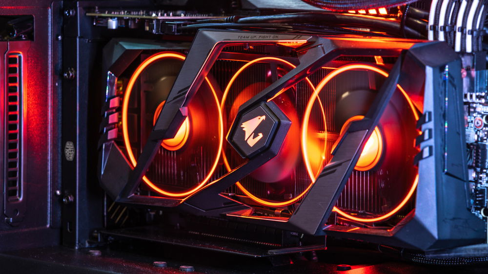 The finished build with a "Fire and Ice" theme showing off the custom modded vertical GPU bracket.