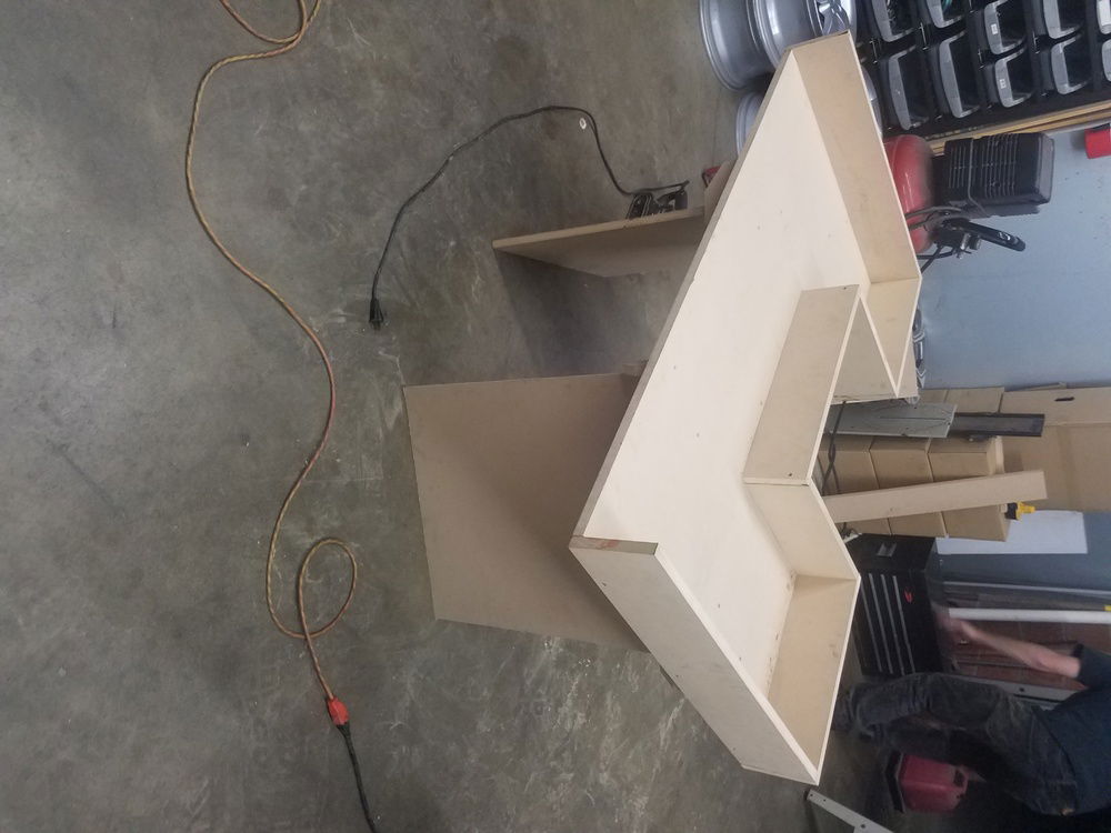 Putting the legs on. Accidentally ruined the back piece at the time and had to cut another one later