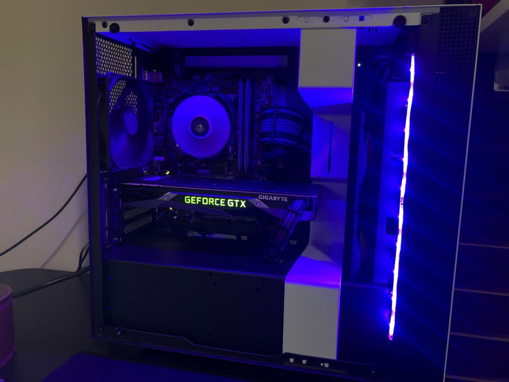 Took off the panel due to the glare. Here you can see all the components to my PC!