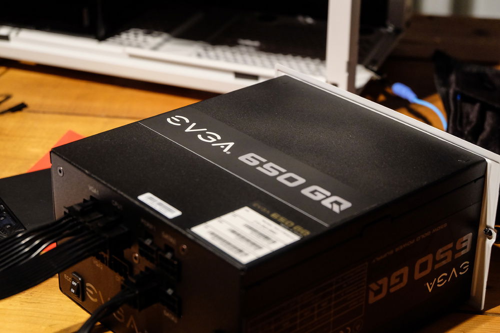 Artistically bluried PSU information with the focus on the name