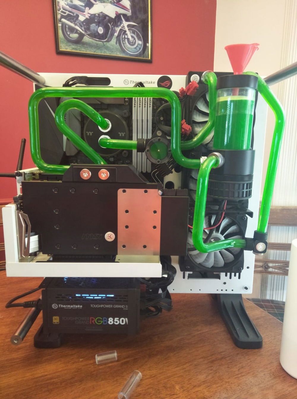 The fourth redo of my hard tube loop I have bent 12 metres of tubing atleast trying to get it right you caan see the drain port was off centre which I did not see untill later then corrected by reduce the drop of the radiator tube