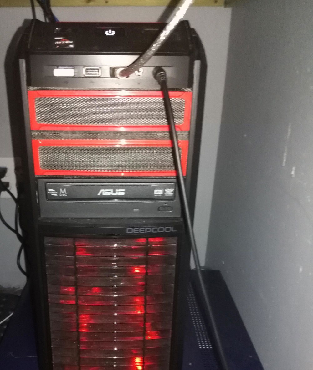 If you ever wanted to see this computer from the front, here you go! I'm not a huge fan of red and black, but I thought it fit well with the Ryzen aesthetic.