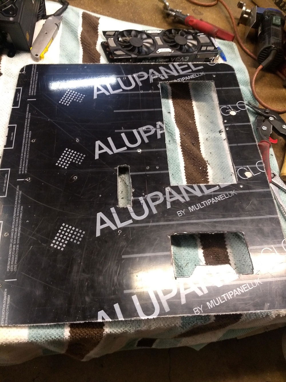 Holes and mounting areas cut and drilled.