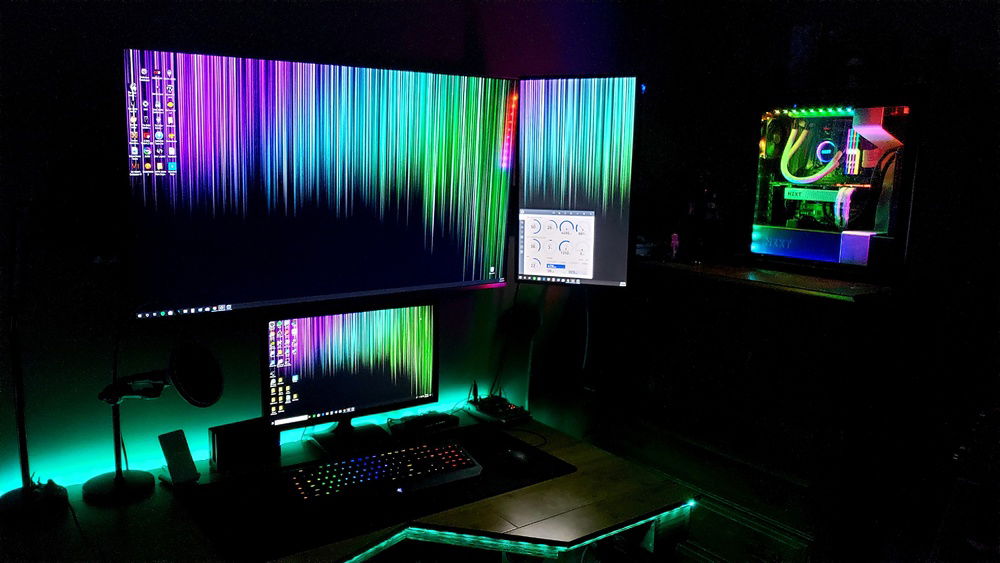 My current Battle Station.  You can't see but my Behringer Mixer is to the right of my monitor and my Shure Microphone is to the left.  Also, yes my deck is custom made out of hardwood bamboo flooring that was hand built by me and my buddy.