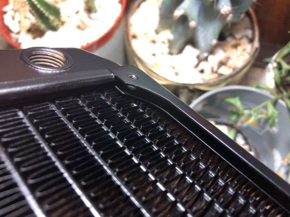 Alphacool radiators might come with a insane amount of flux residue on the inside from the factory, but it's impossible to deny their performance capability. Not to mention they were the first ones to put fin guard under the radiator screw holes.