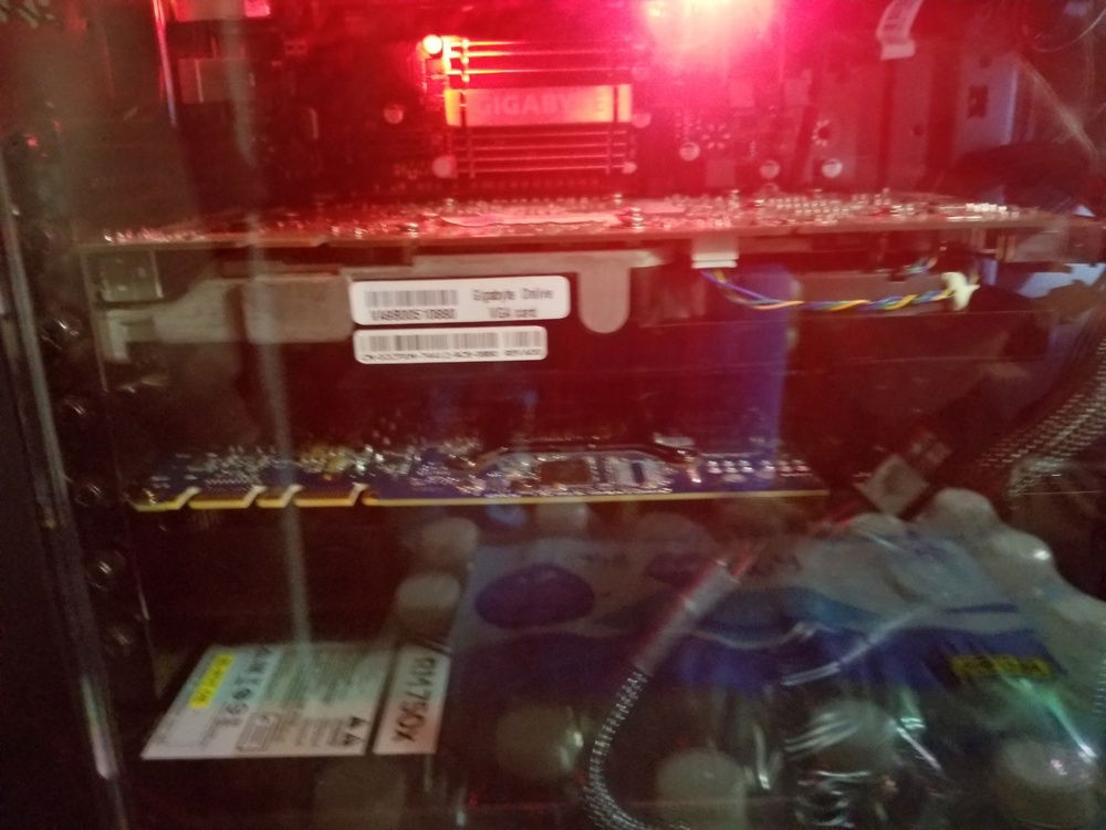 Showing both video cards, the 9800GT on top, and the OEM 760ti on bottom.